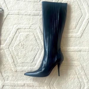 Knee length black stiletto leather boots size 40.